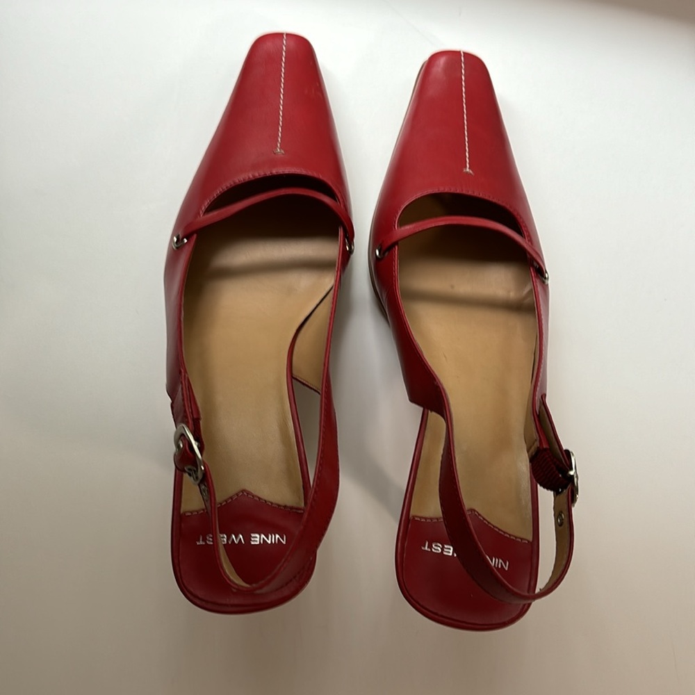Red leather Nine West heels. BNWT. Size 7. Can be dressed up or down.